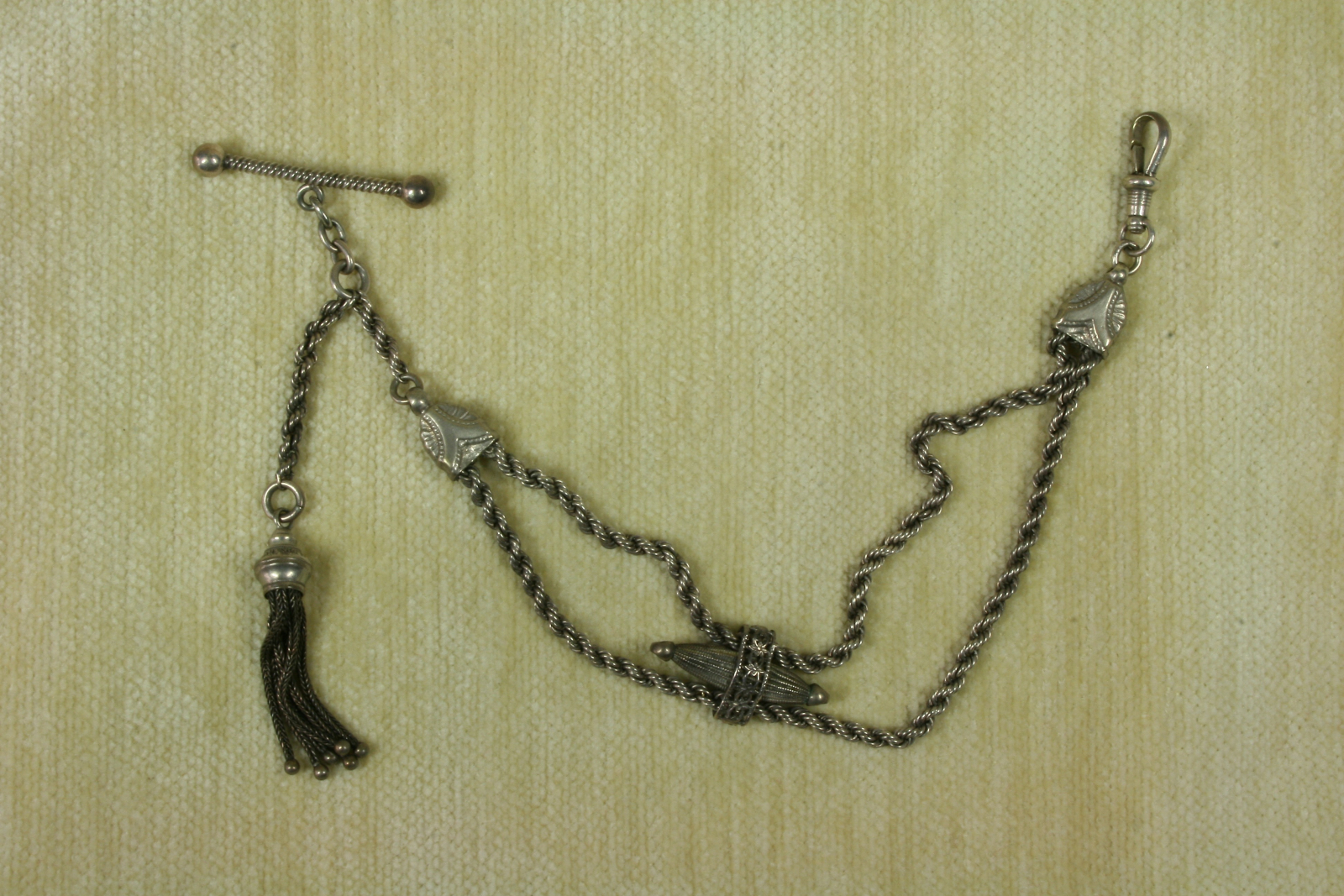 Antiques of leontina with double strand and chains single albert