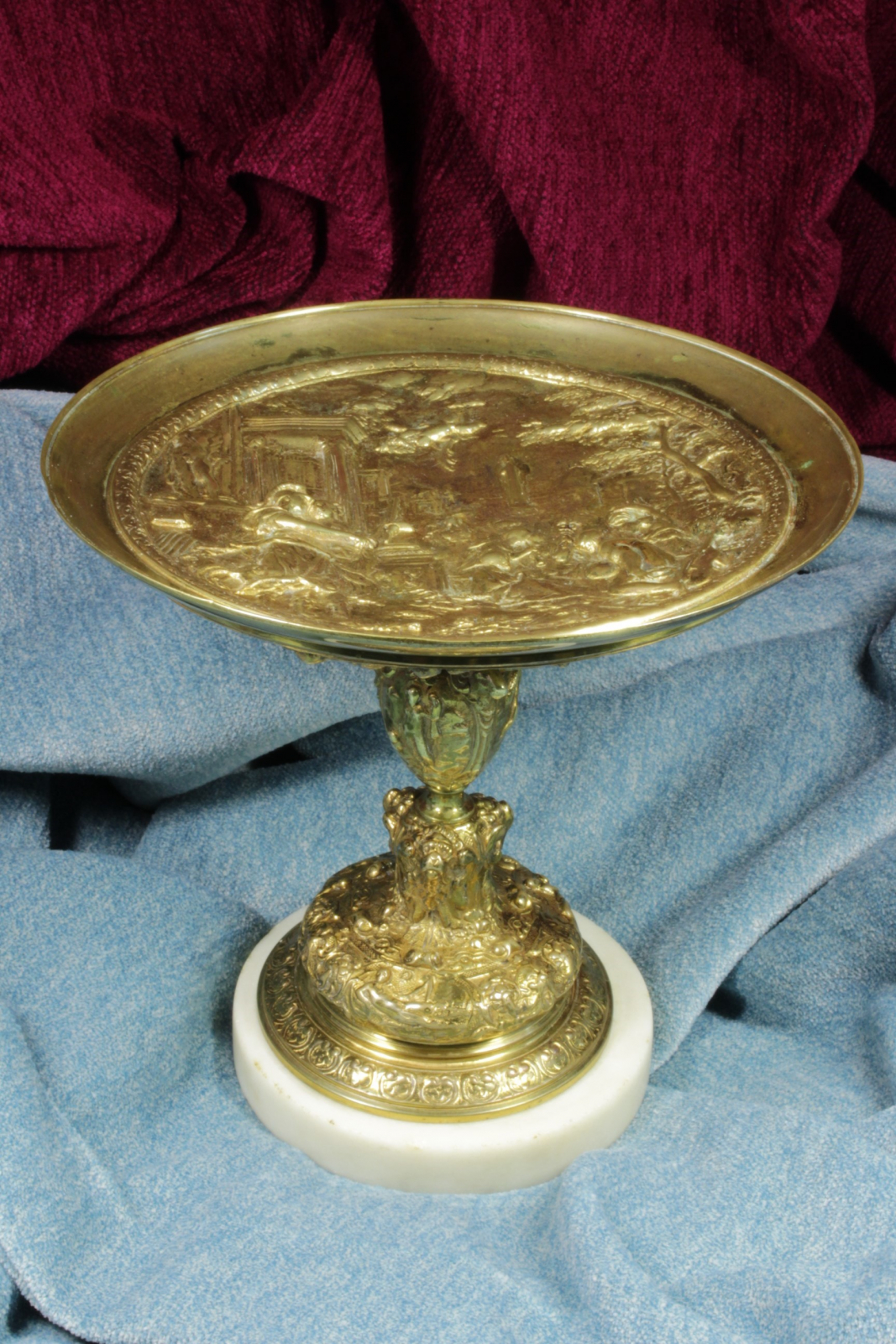 Antiques of center table with gold cup source