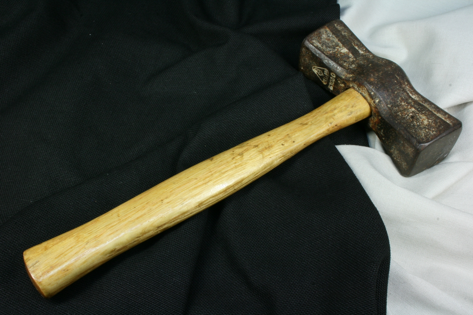 Antiques of hammer brand acorn iron and wood tool