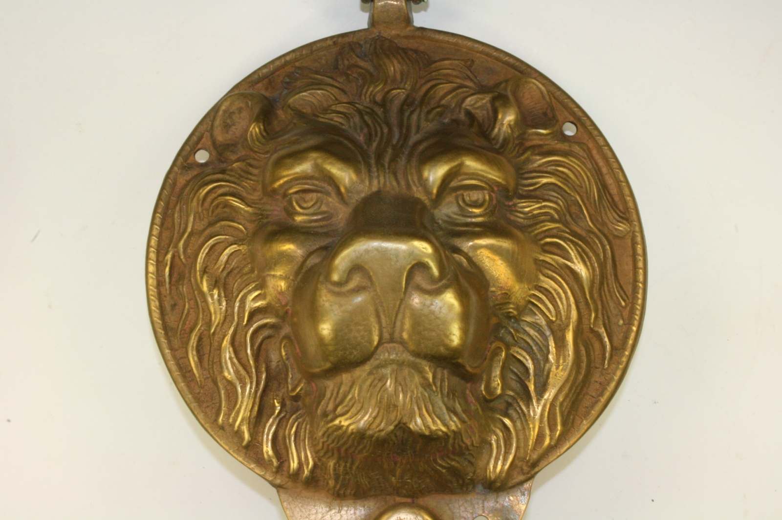 Antiques of knocker with lion face