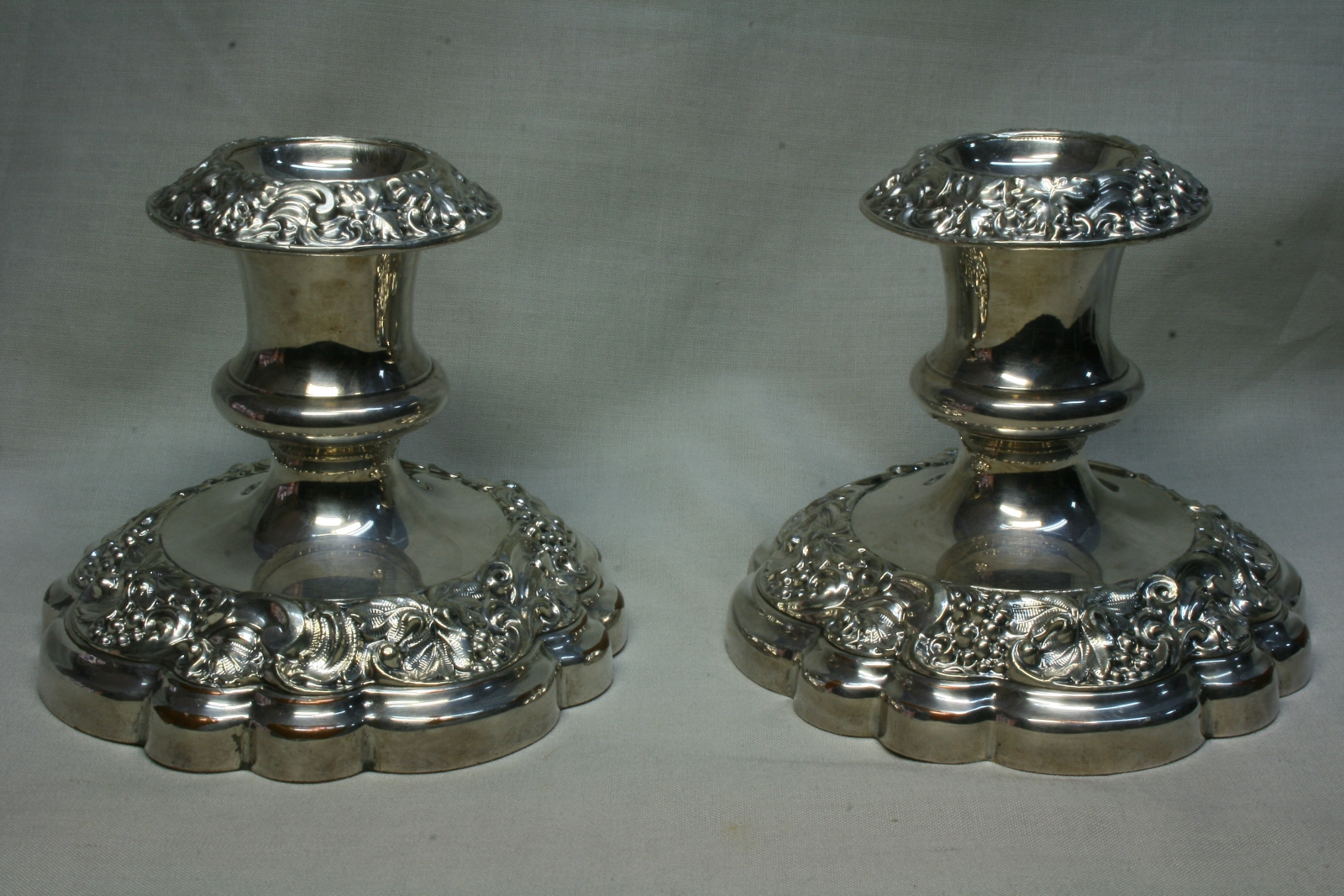 Antiques of pair of silver candlesticks