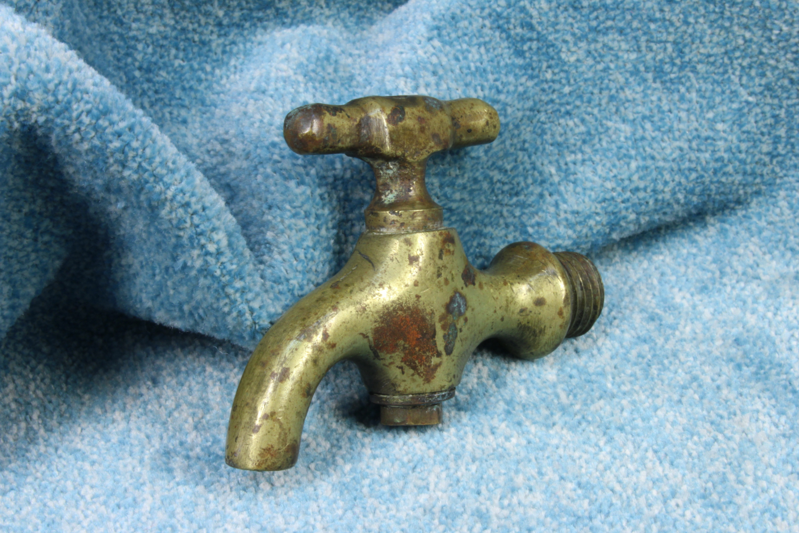 Antiques of miniature brass tap