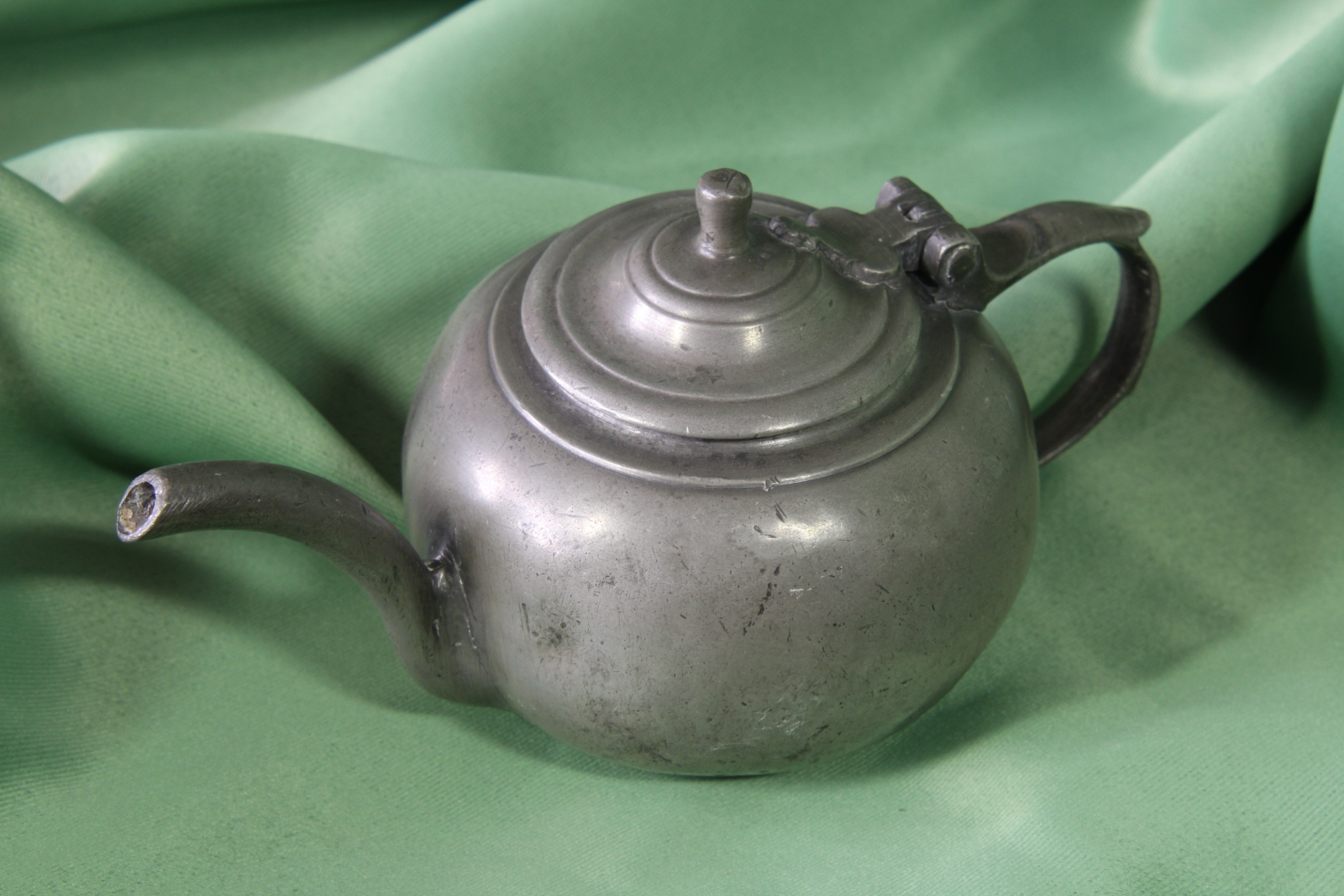 Antiques of pewter individual teapot white metals