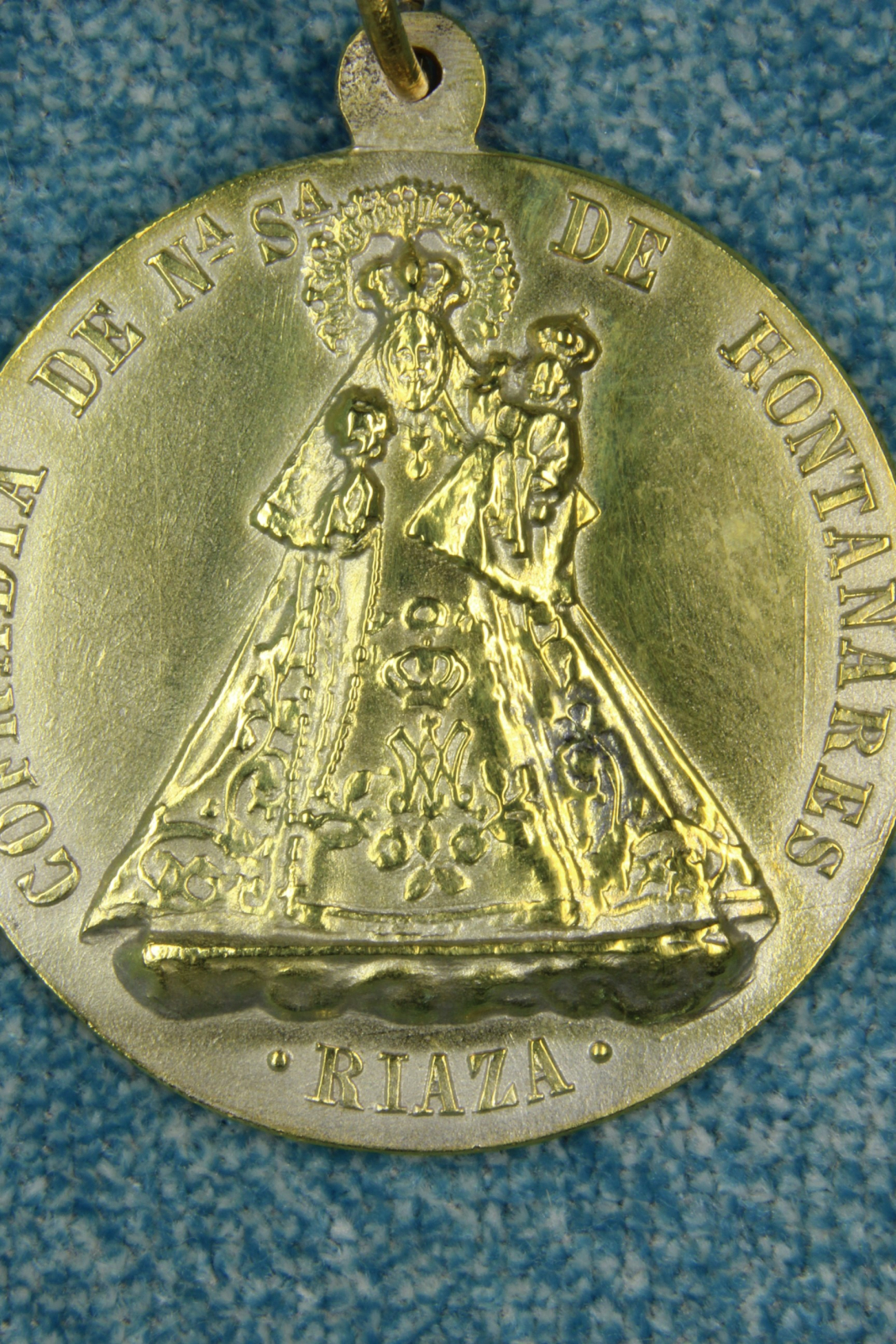 Antiguedades de medalla virgen hontanares