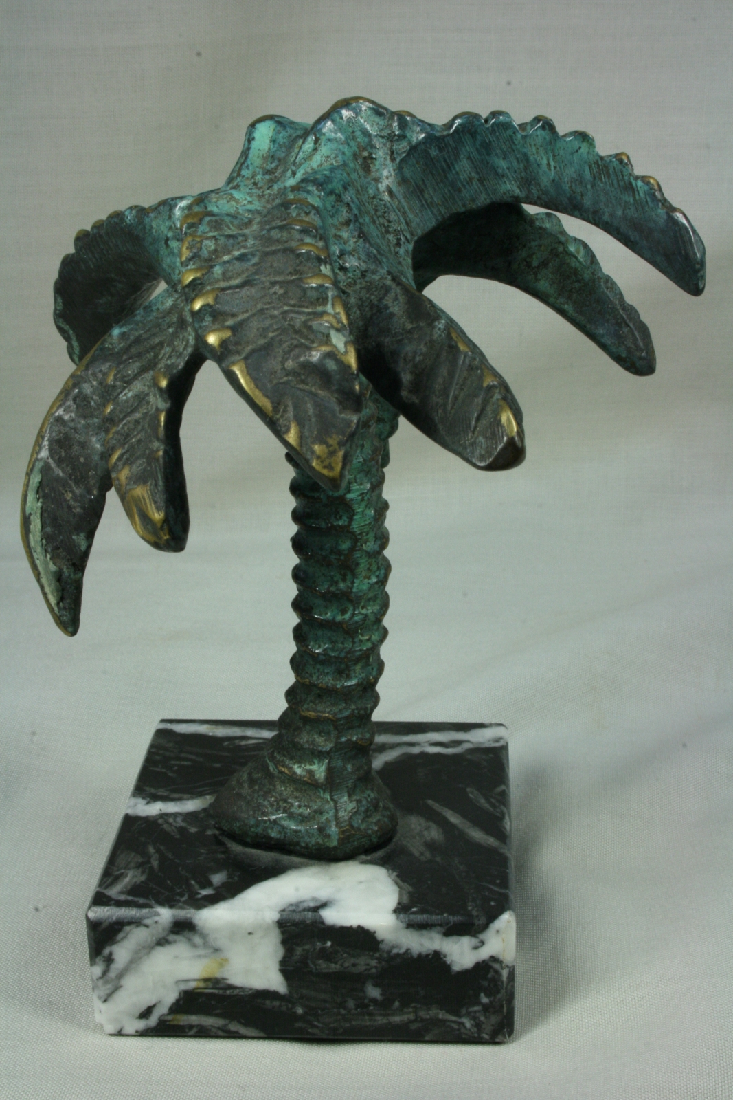 Antiques of palm tree bronze and marble base