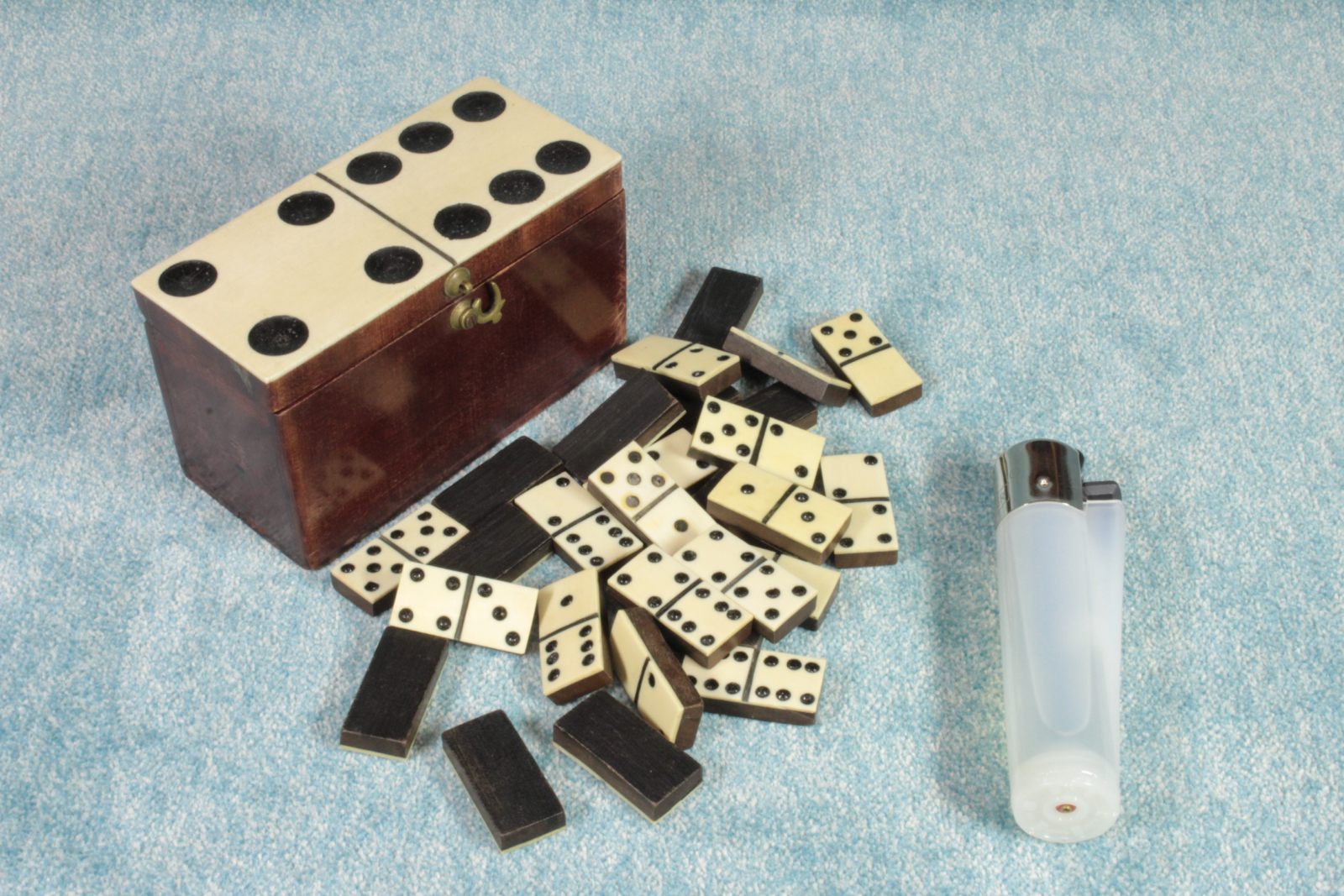 Antiques of miniature dominoes made of wood and bone