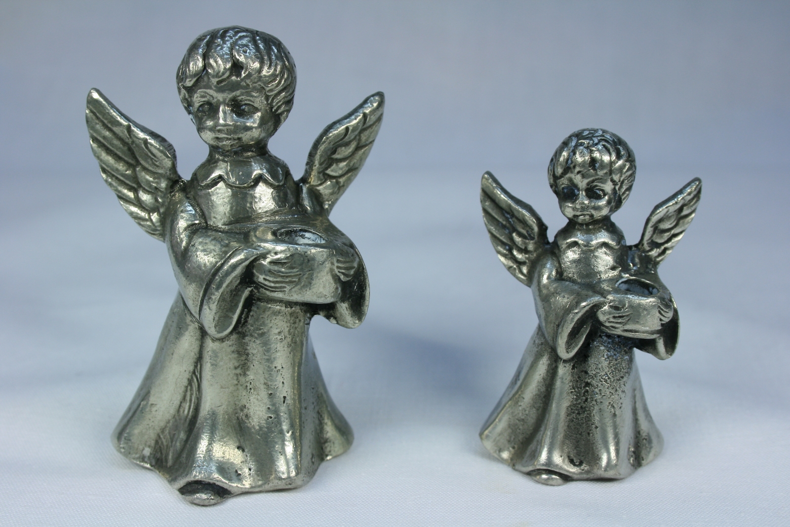 Antiques of couple of angels candleholder