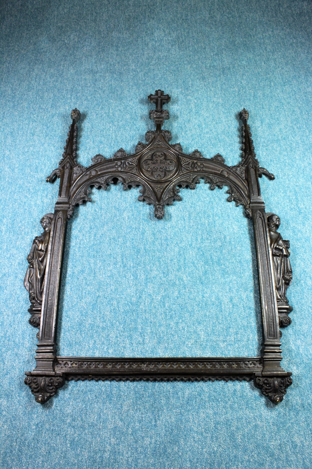 Antiques of neogothic bronze frame with black patina