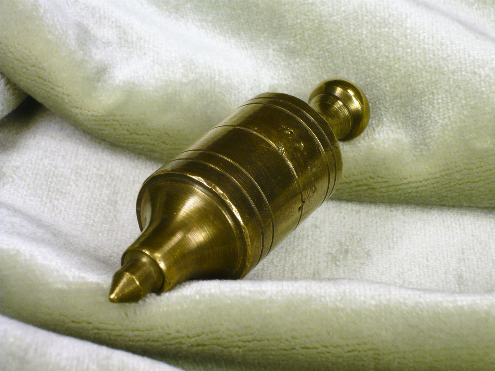 Antiques of plumb bob construction without nut threaded head