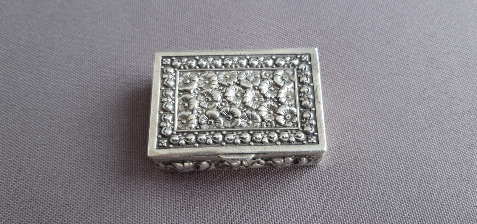 Antiques of silver pill box with flowers k thamar