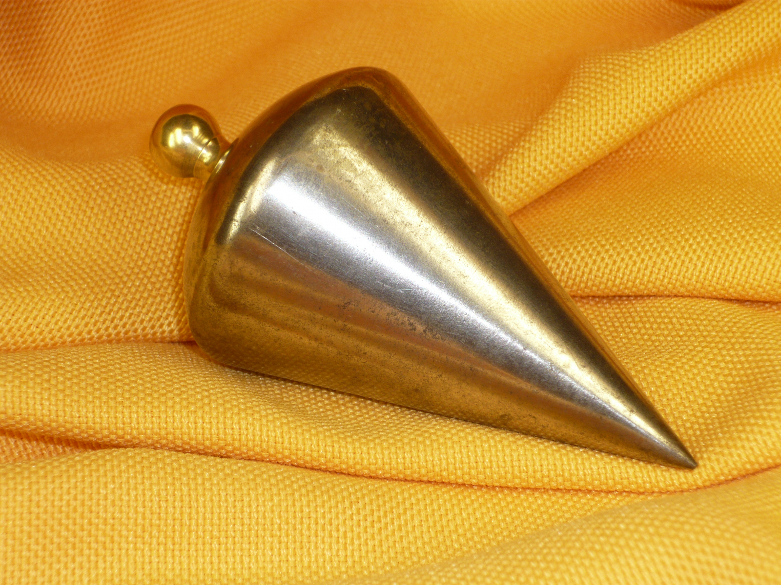 Antiques of instrumental nickelplated iron plumb bob