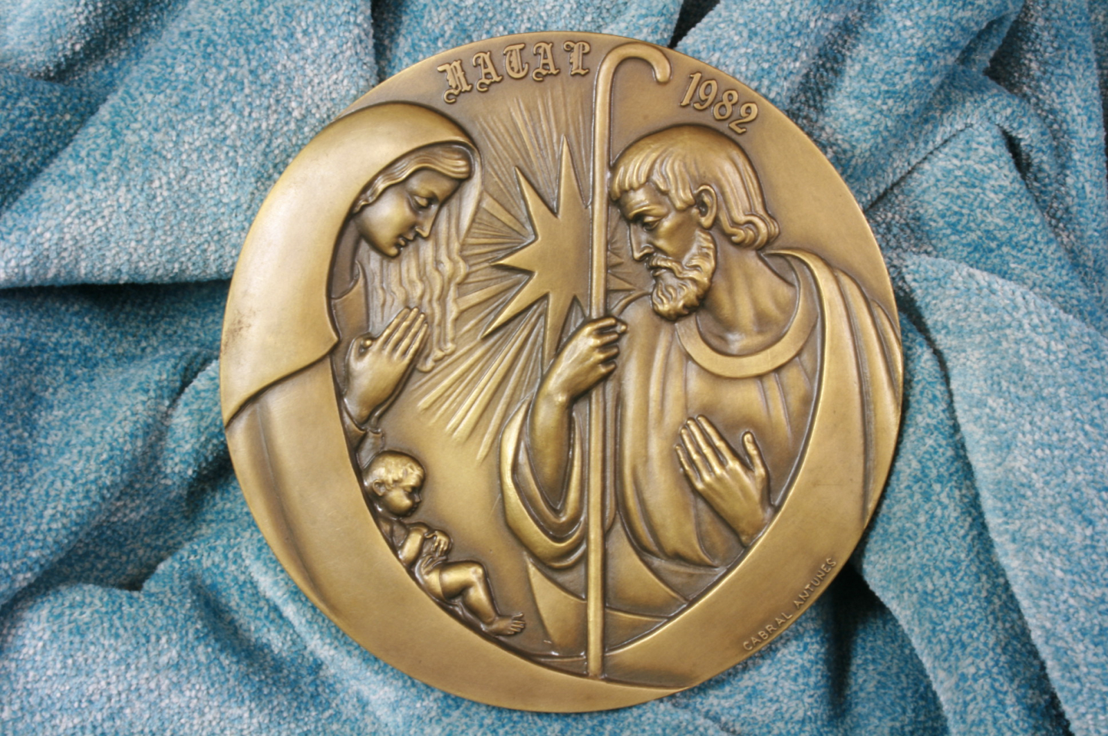 Antiques of bronze medallion natal