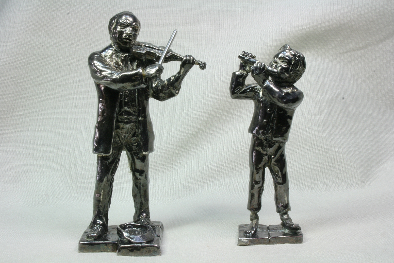 Antiques of couple of musicians figures