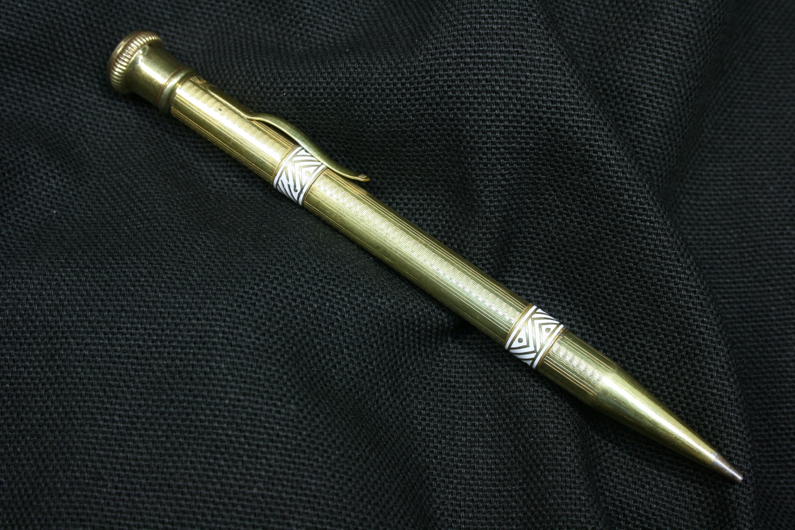 Antiques of gold plated pencil white enamel