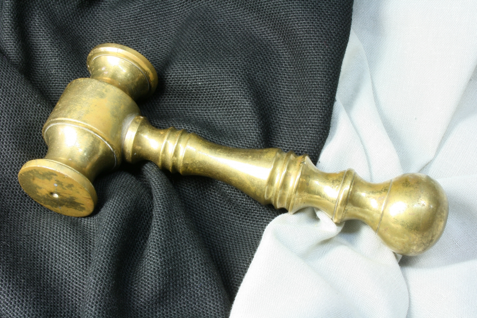 Antiques of small brass mallet hammer