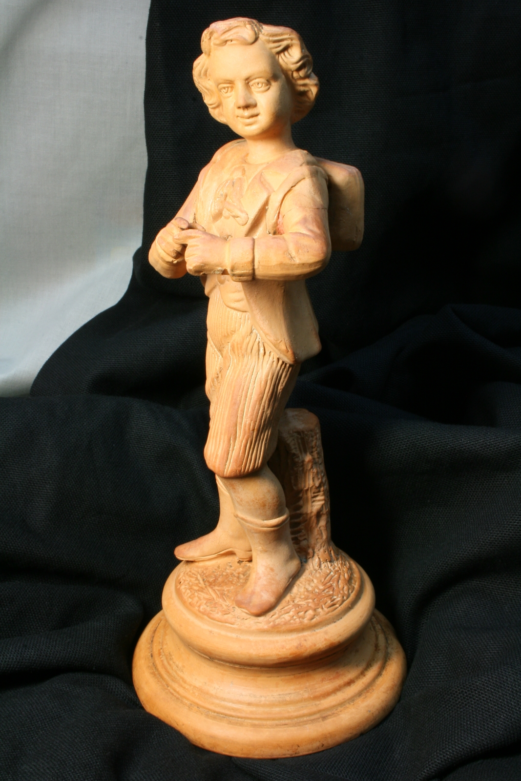 Antiques of young student terracotta