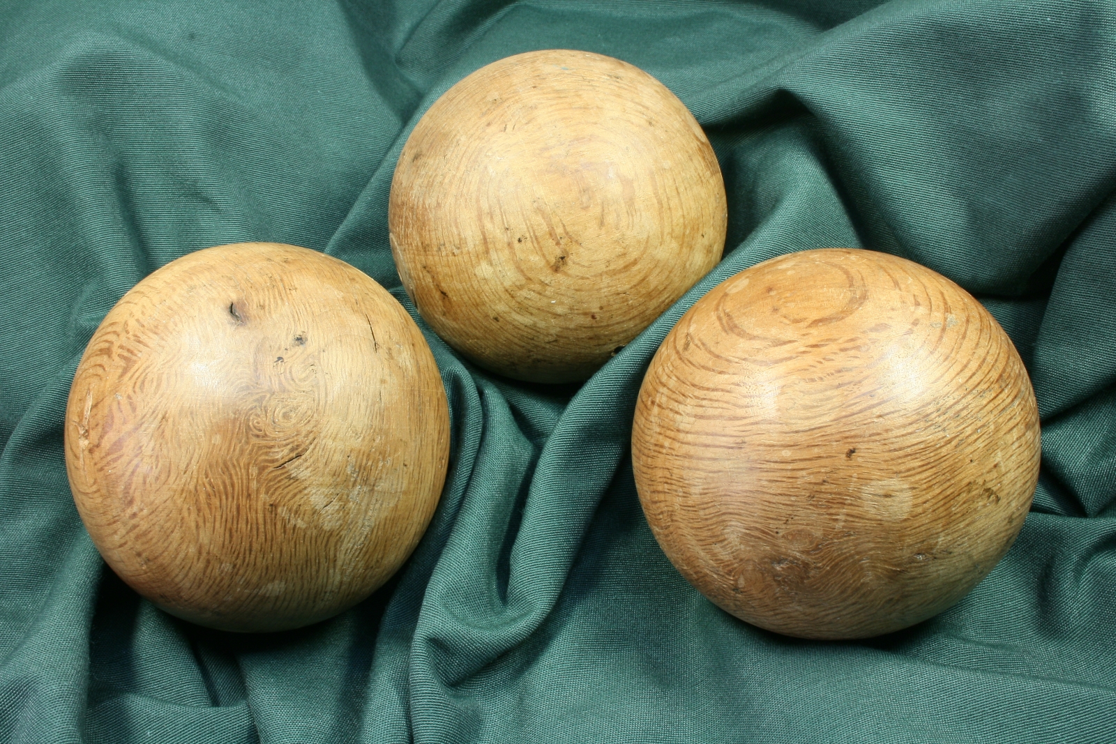 Antiques of trio of old wooden balls three spheres