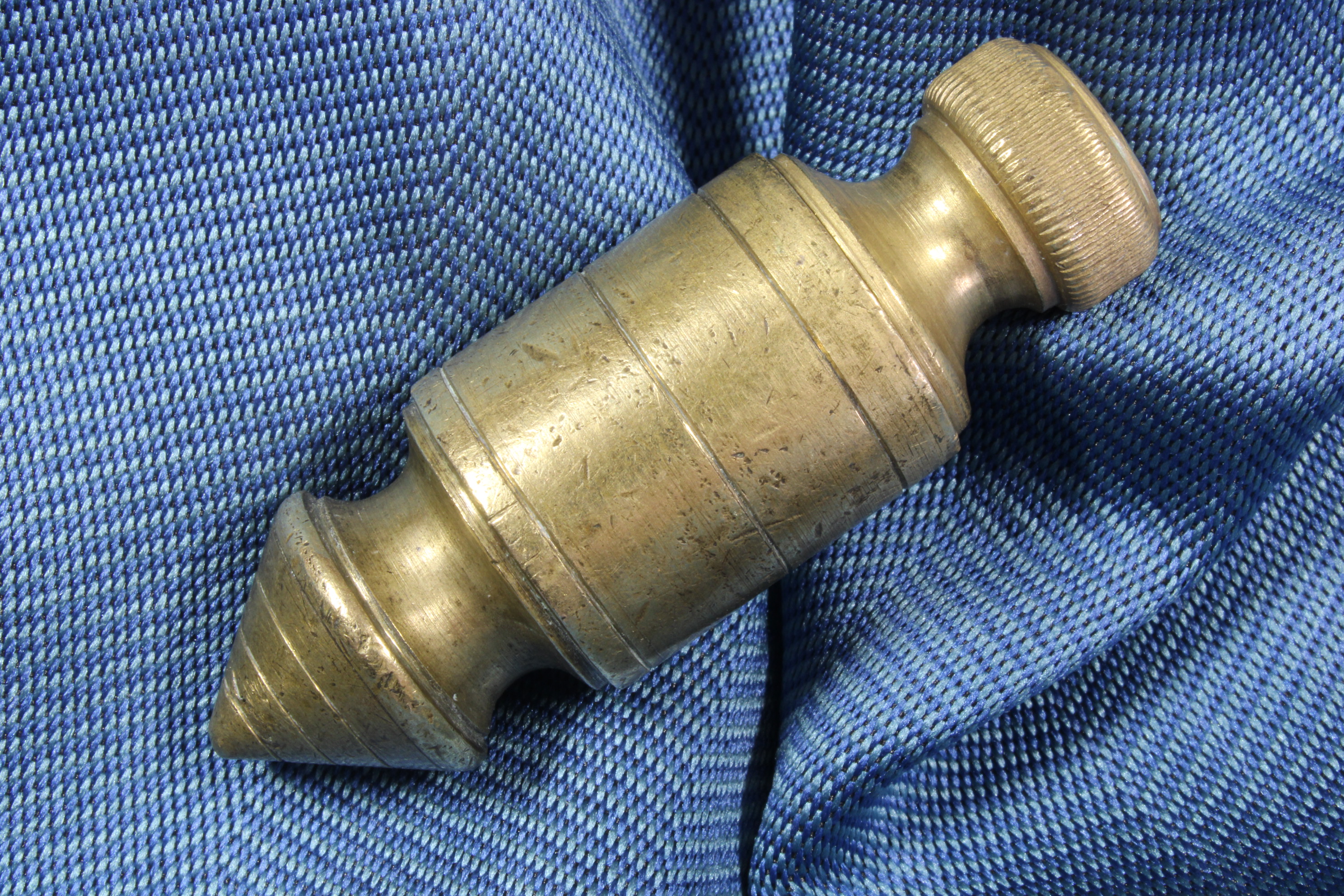 Antiques of bronze perico plumb bob