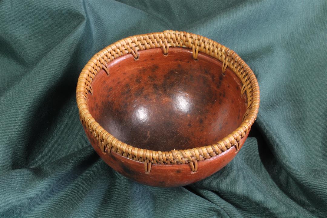 Antiques of earthenware and wicker bowl hand made