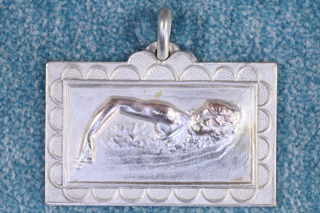 Antiques of medal swimming unmarked