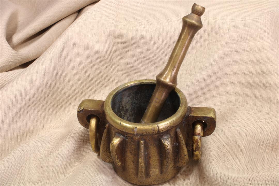 Antiques of mortar with ribs and hand reproduction