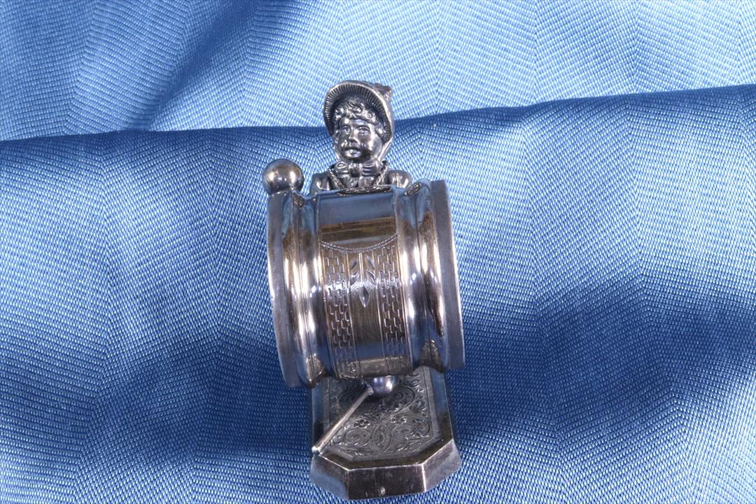 Antiques of napkin ring girl simpson hall miller co modernist