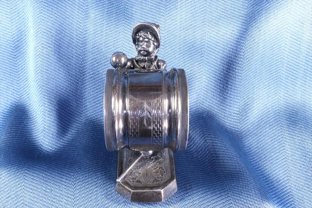 Antiques of napkin ring girl simpson hall miller co modernist