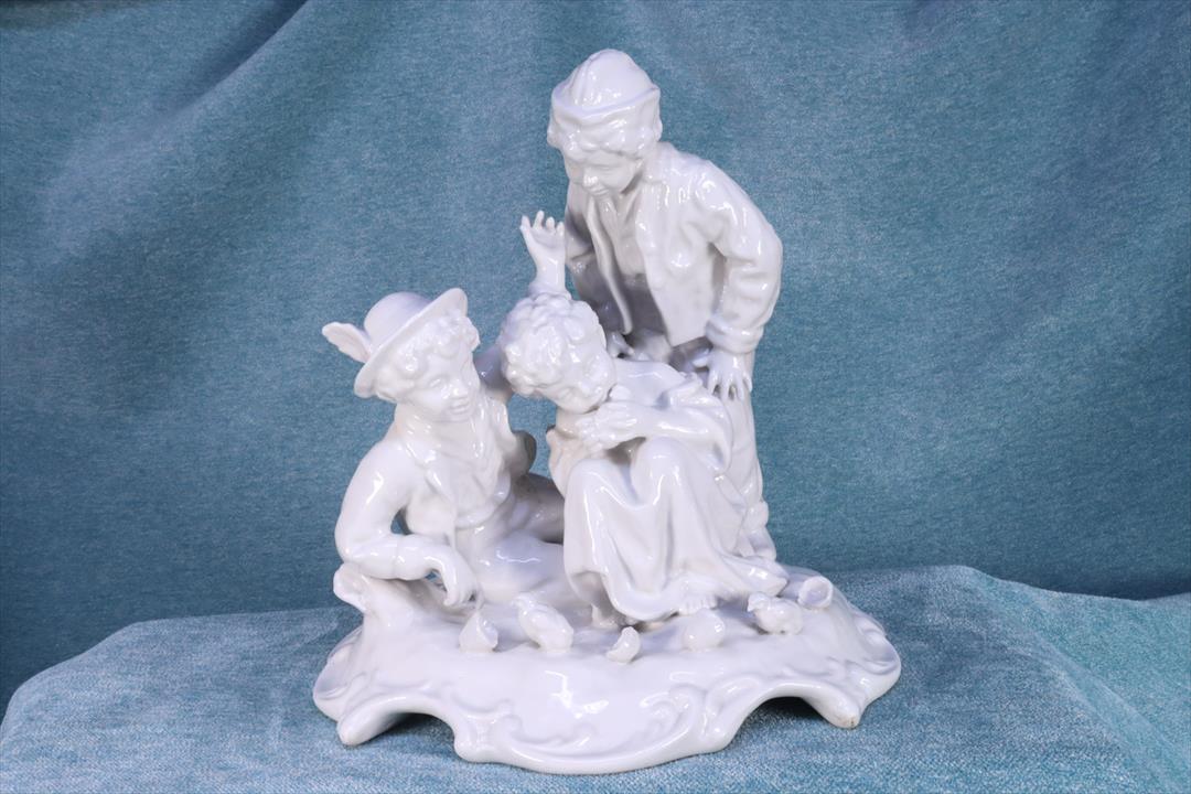 Antiques of porcelain sculpture three children with birds