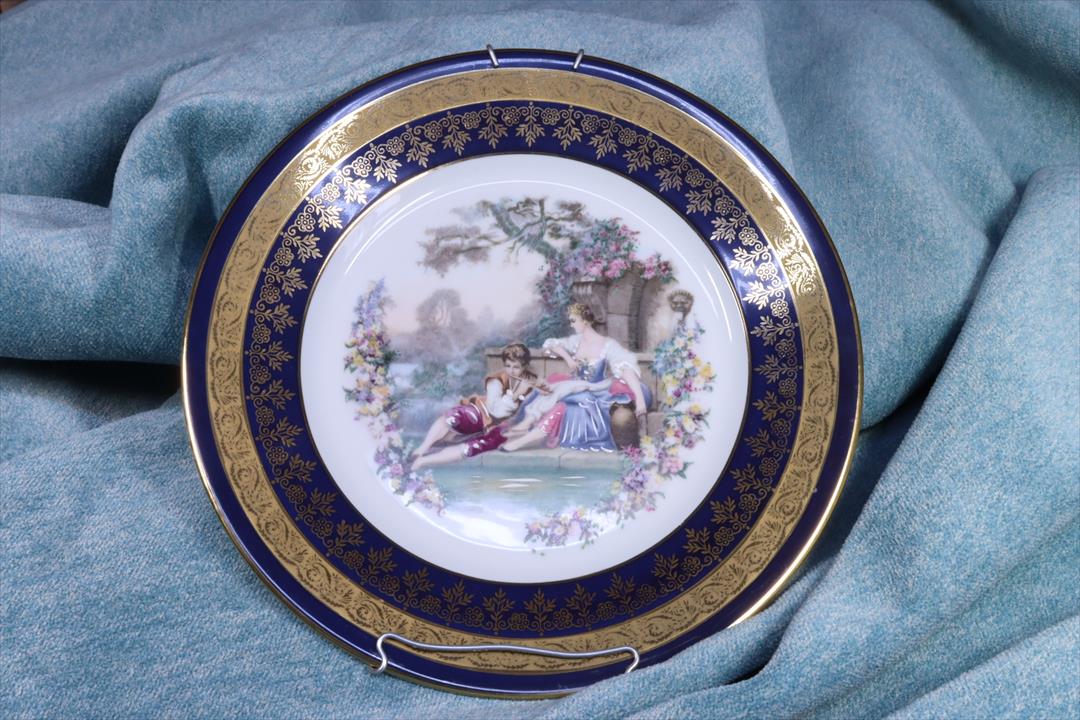 Antiques of romantic limoges plate blue with golden border