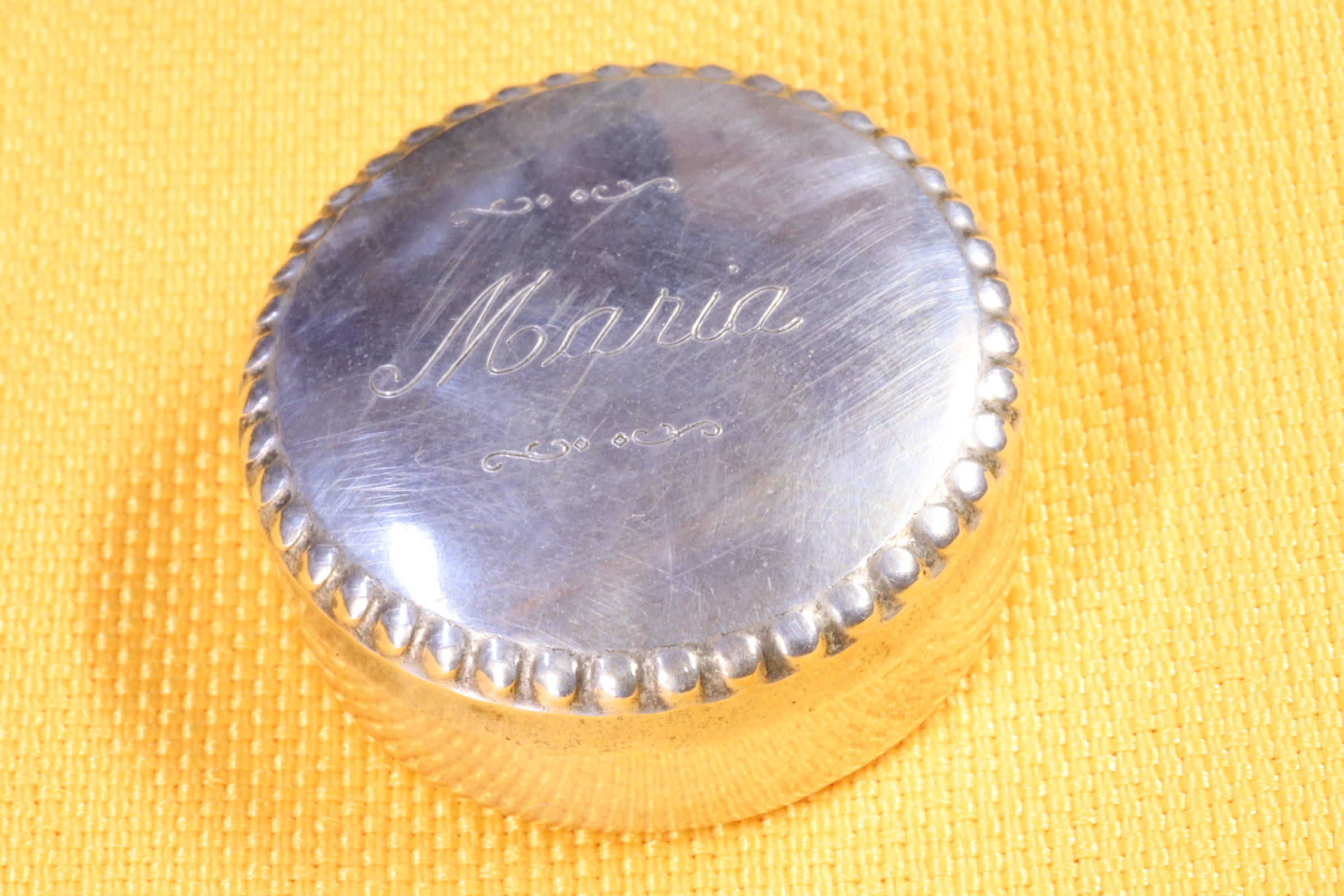 Antiques of round pill box silver engraved mary