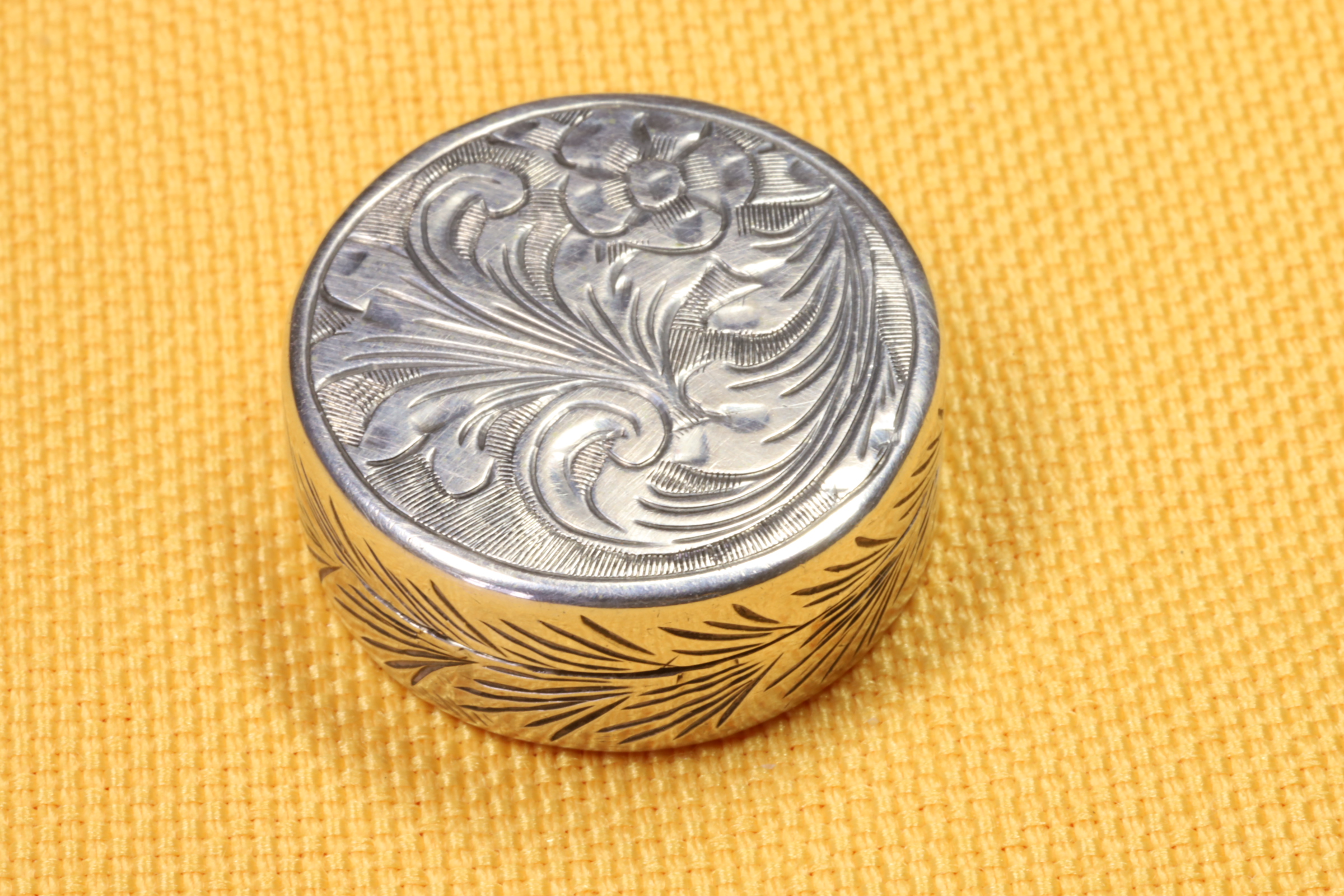 Antiques of round silver pillbox chiseled