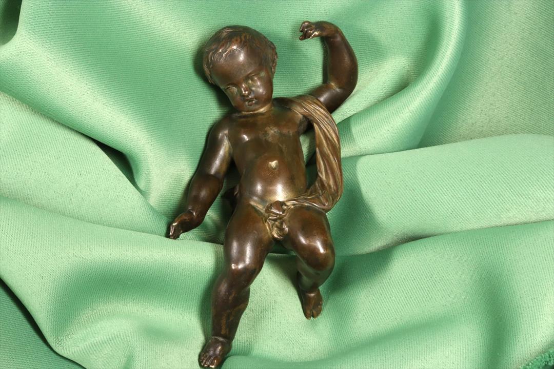 Antiques of sculpture reclining child bronze