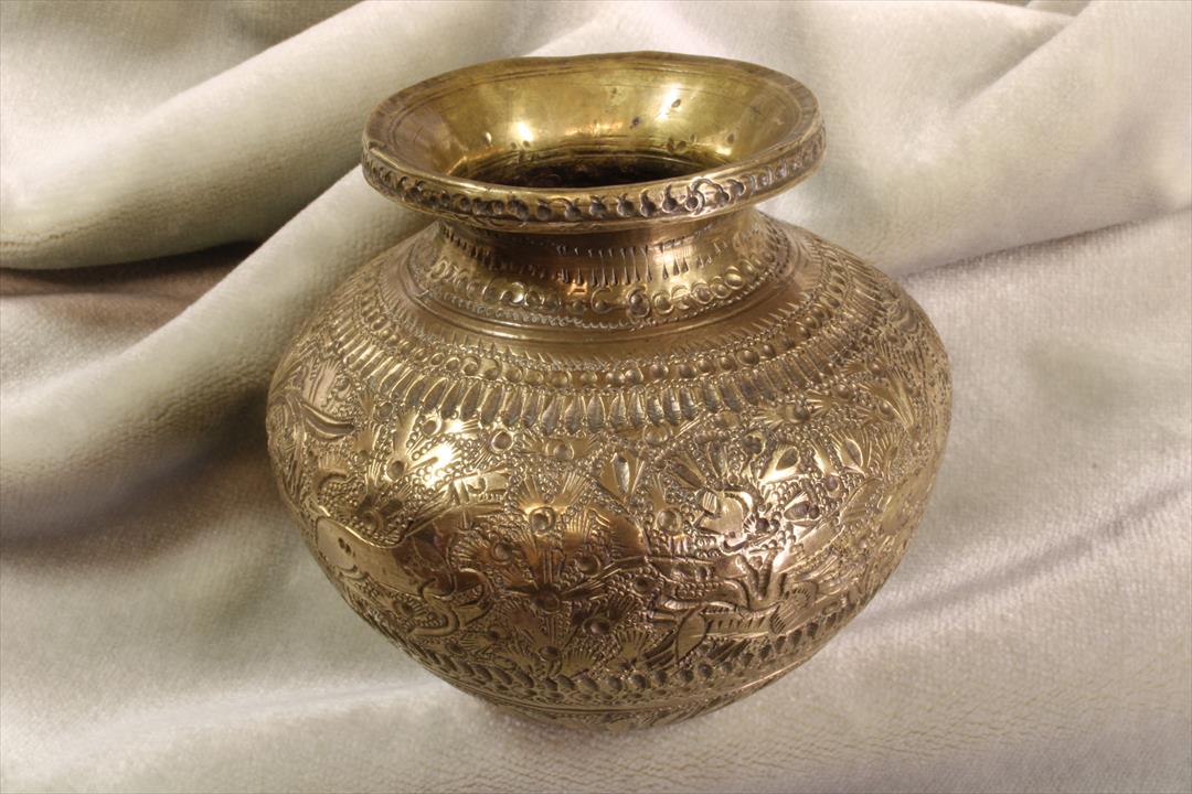 Antiques of small chiselled vase indopersian