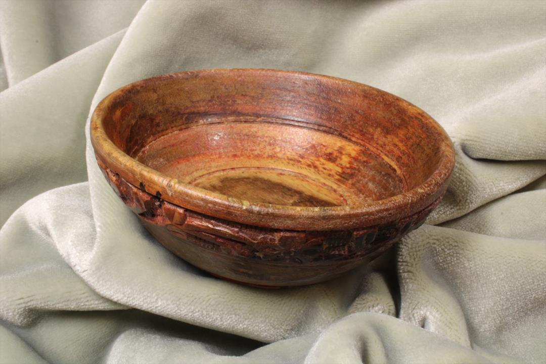 Antiques of wooden bowl with carved border