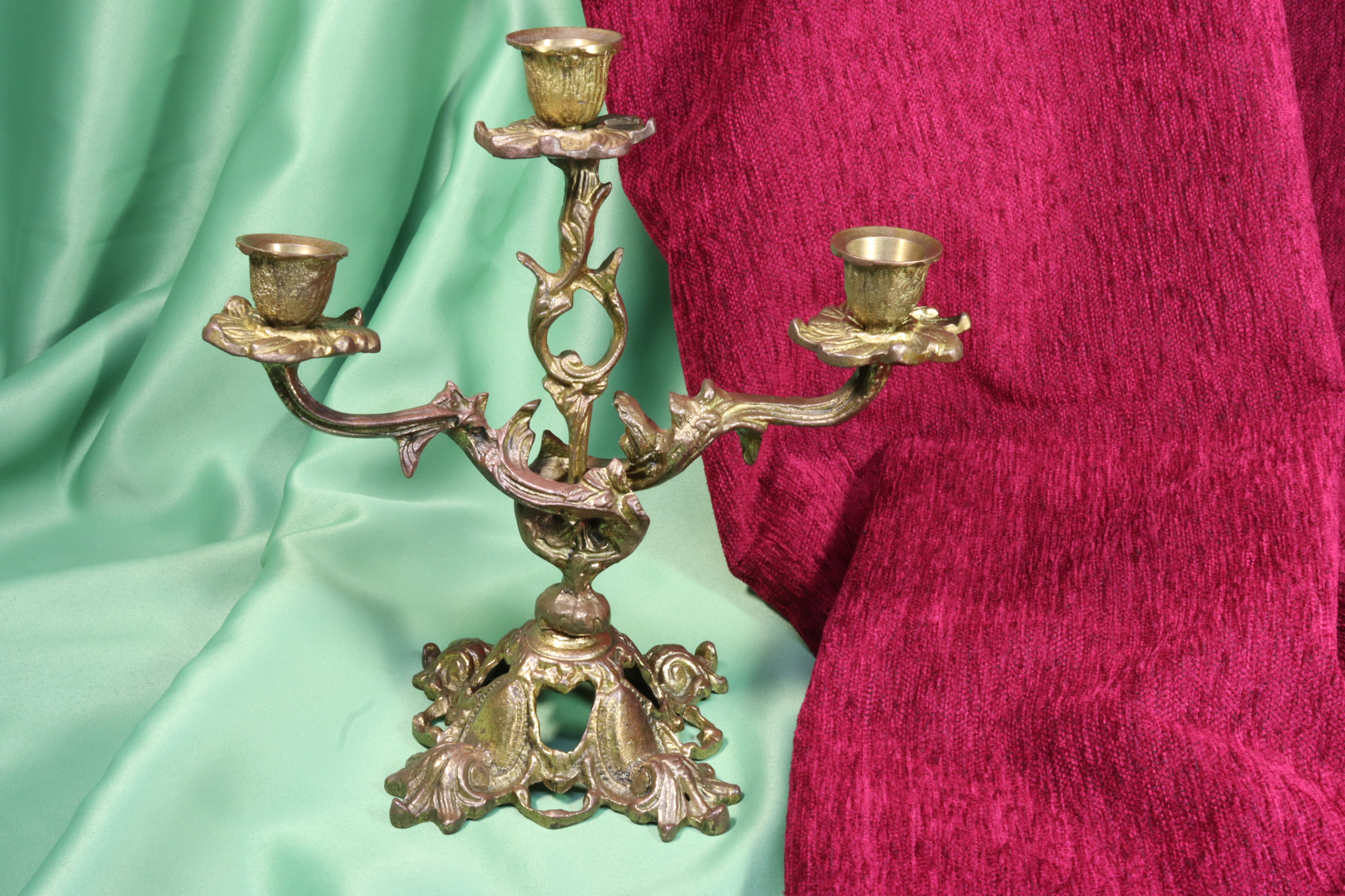 Antiques of bronze candlestick floral motifs