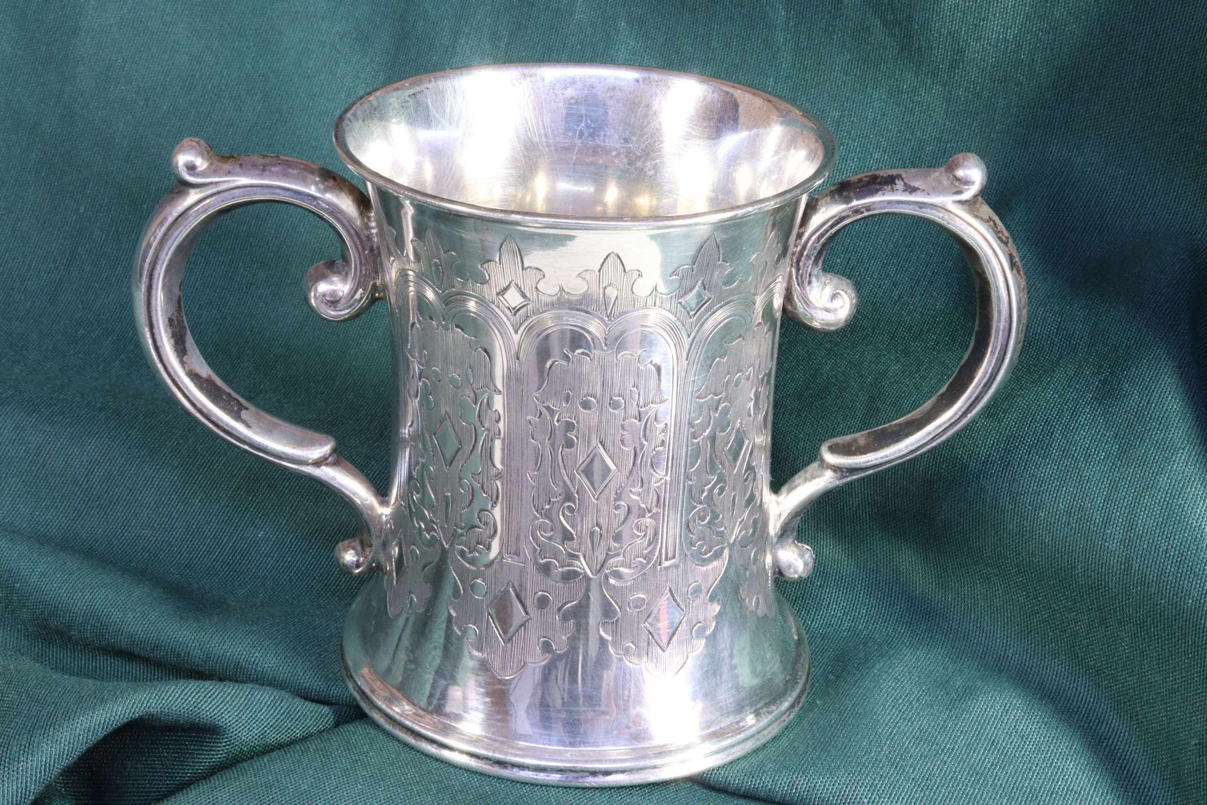 Antiques of jug tumbler with two handles chiseled english